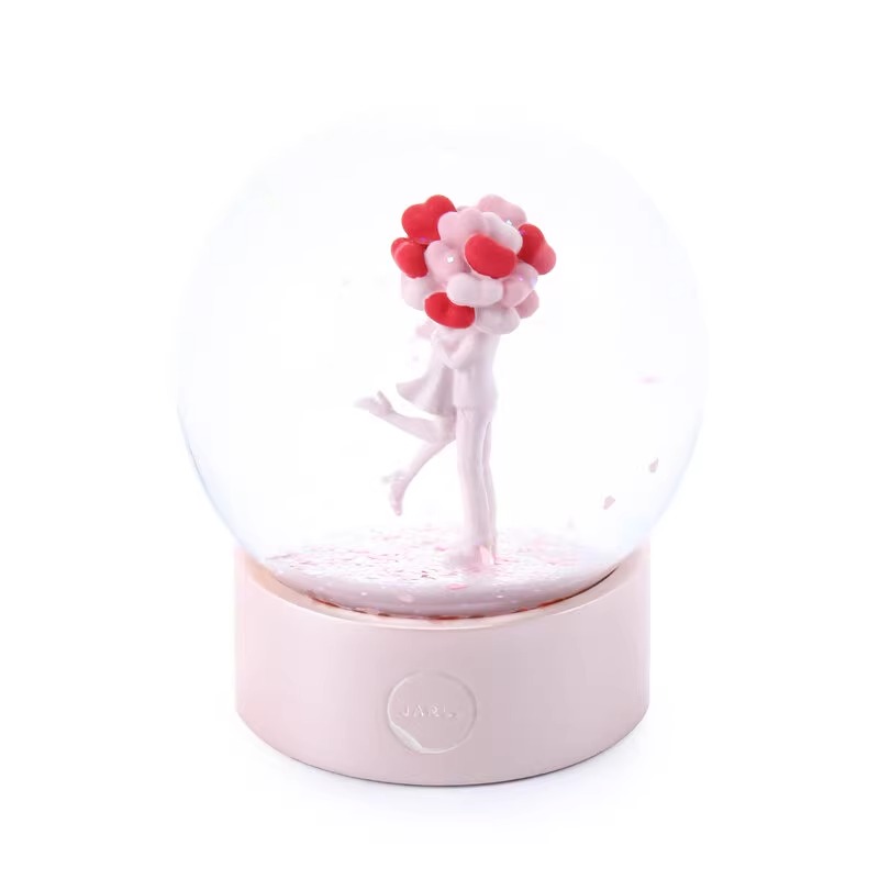 Snow Globe Couple Holding Heart Pink